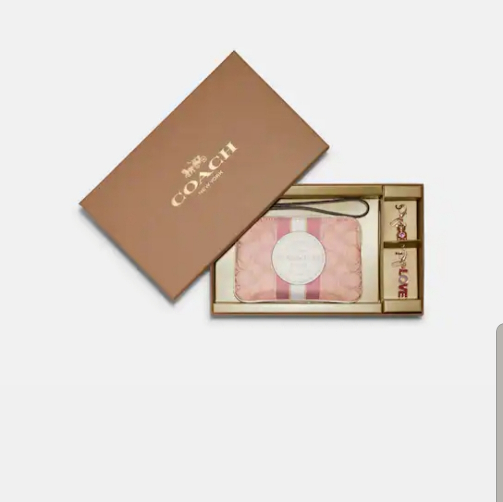 Signature Coach Wristlet